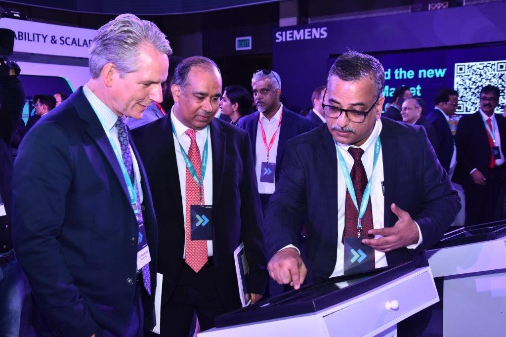 Dr Peter Koerte, Chief Technology and Strategy Officer, Siemens AG (L) and Sunil Mathur, MD & CEO, Siemens Ltd (second from left) at Siemens Innovation Day 2022